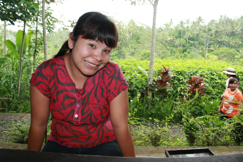 My server at Bali's cool, refreshing coffee plantation