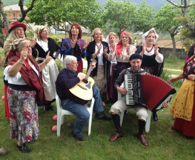 Women sing traditional traditional Abruzzese songs at the Primo Maggio celebration.