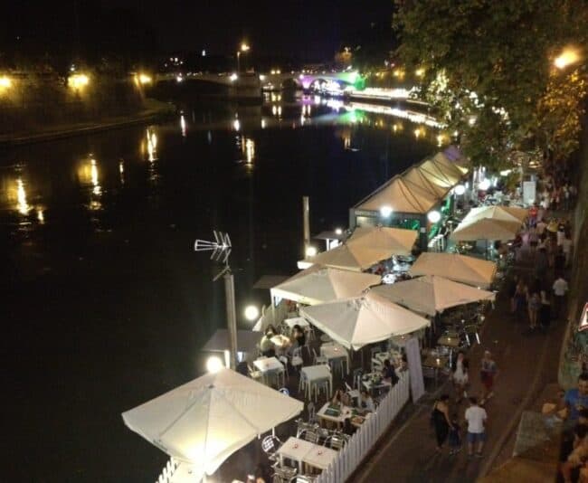 For 12 straight summers, Rome has lined the Tiber River with temporary restaurants, bars, boutiques and art galleries.