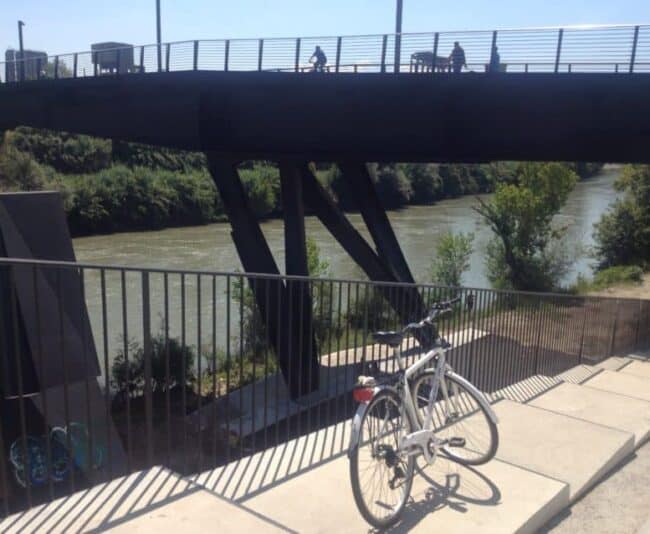 The "path" leading to the bike path along the Tiber River.