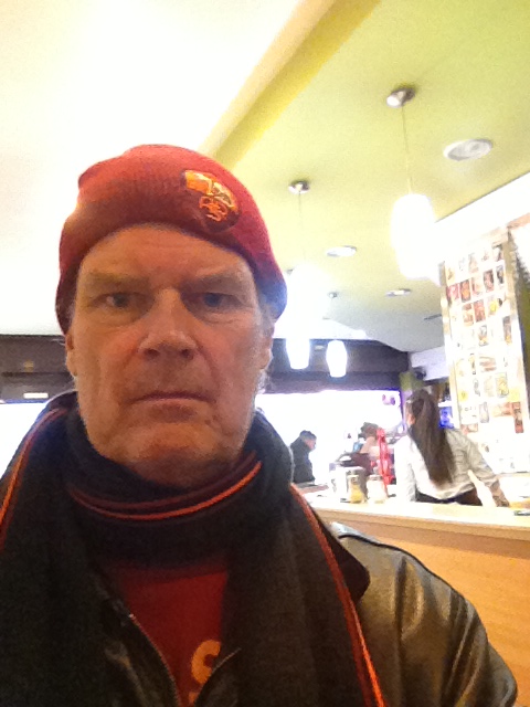 Me Wednesday at the Caffe In where I wrote while dressed more appropriately for a football game in Buffalo.