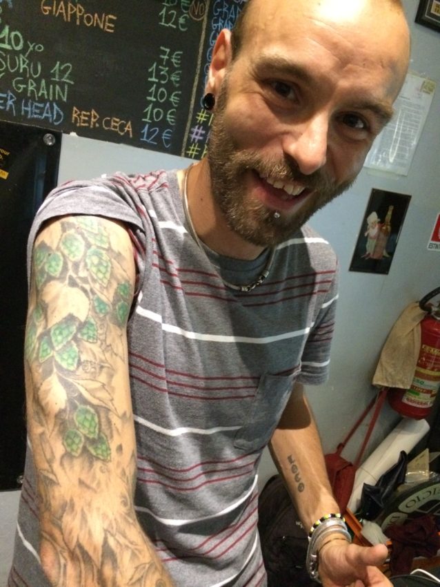 Bartender Massimiliano Vichi displays the hops tattoed on his arm at Birra Piu.