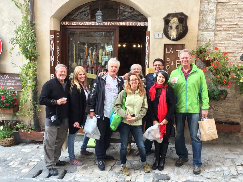 The gang at the end in front of La Bottega Di Teresa in Spello, Teresa is back row, third from right.