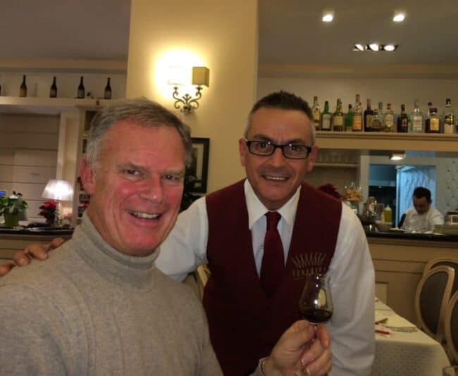 Me with Marco Uras, a waiter for 30 years, at Mamma Venerina near the Vatican.