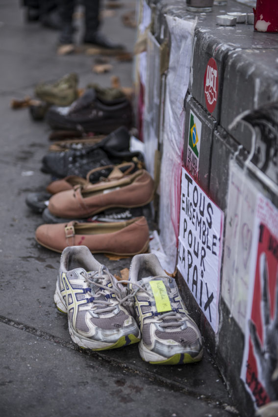 Shoes of the dead. Note the blood stains. Photo by Marina Pascucci