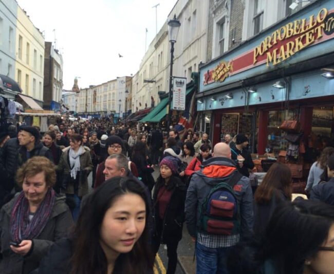Portobello Road Market, specializing in antiques, is one of 73 public markets in London.