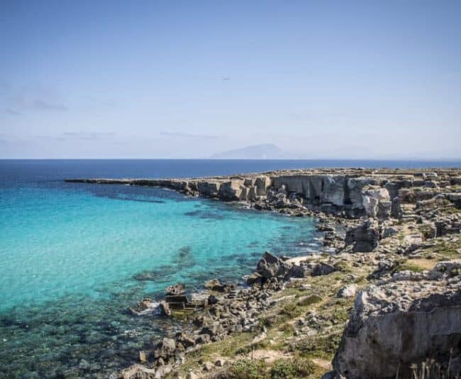 Favignana's Cala Rossa, once the site of a great Roman victory in the 3rd century BC, now sport's some of clearest water in the world. Photo by Marina Pascucci