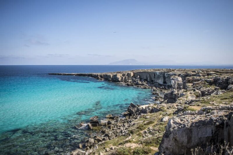 Favignana's Cala Rossa, once the site of a great Roman victory in the 3rd century BC, now sport's some of clearest water in the world. Photo by Marina Pascucci