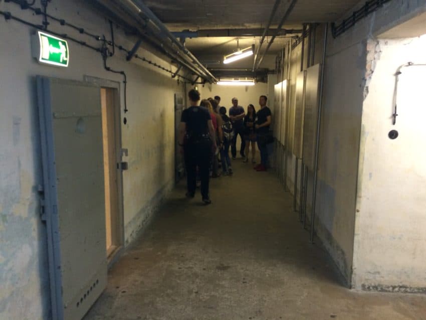 A hallway with some of the 200 interrogation rooms.