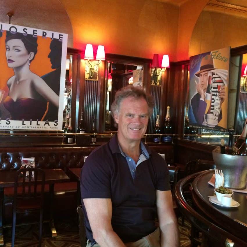 Me in Ernest Hemingway's old barstool in La Closerie des Lilas where he penned much of "The Sun Also Rises."