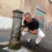 Me at one of the "nasone" in steaming Rome. The city has 2,500 of them but the water shortage has closed 400 of them.