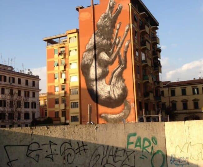 This painting of A.S. Roma's wolf can be seen from much of my Testaccio neighborhood where it was born in 1927.