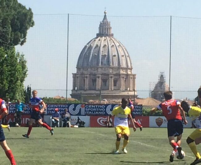 St. Peter's Basilica offered an appropriate backdrop for Saturday's final of the Clericus Cup, the Vatican soccer league made of priests and seminary students.