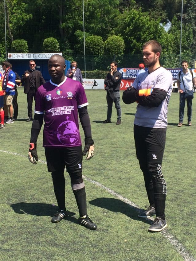 Goalkeepers Emmanuel Umanah of Collegio Urbano and Nigeria and Stephen Cieslak of the North American Martyrs and Portland, Oregon, before the shootout.