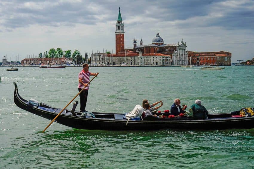 A gondolier with Giudecca, the southern most neighborhood in the background. Photo by Marina Pascucci