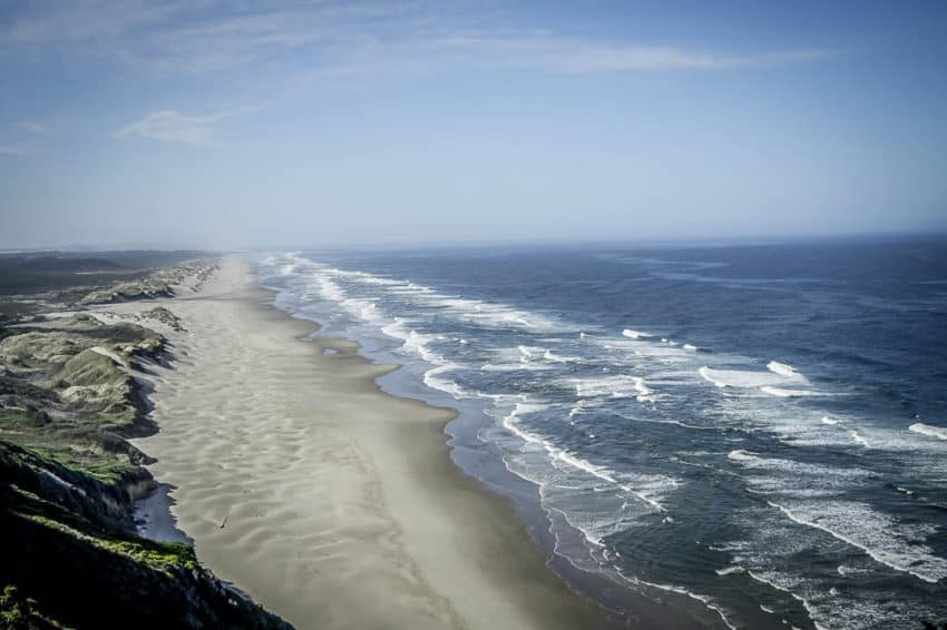 This wide stretch of unspoiled sandy beach south of Yachats can be seen all over the Oregon Coast. Photo by Marina Pascucci