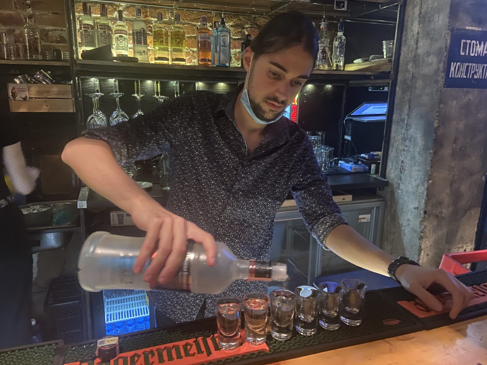 A bartender prepares our shots at Stroeja.