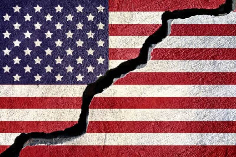 Concept american flag on cracked background