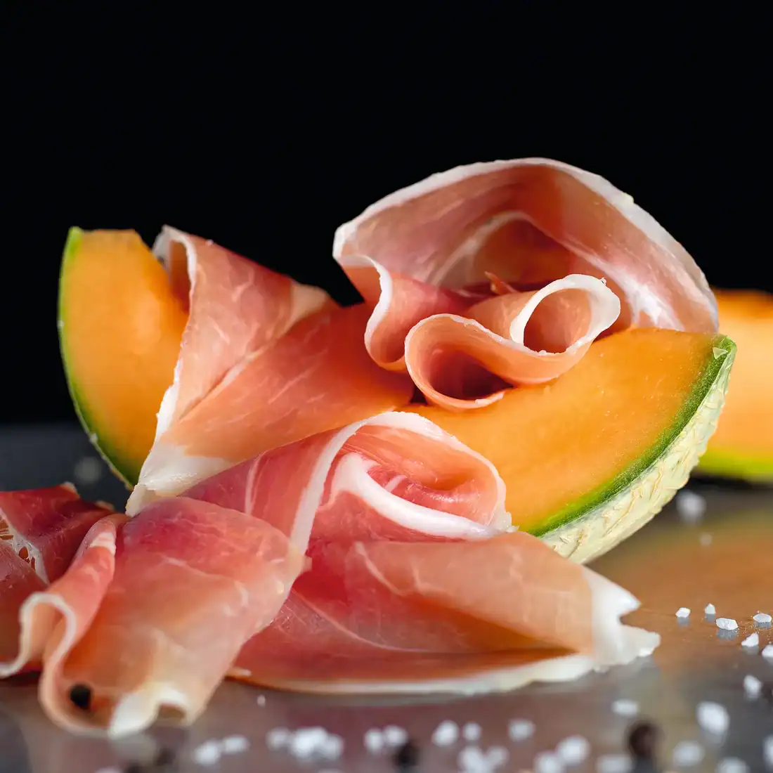 Prosciutto e melone is consumed frequently in Rome during the hot summer.