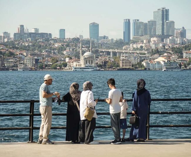 People fishing off the pier in Moda on Istanbul